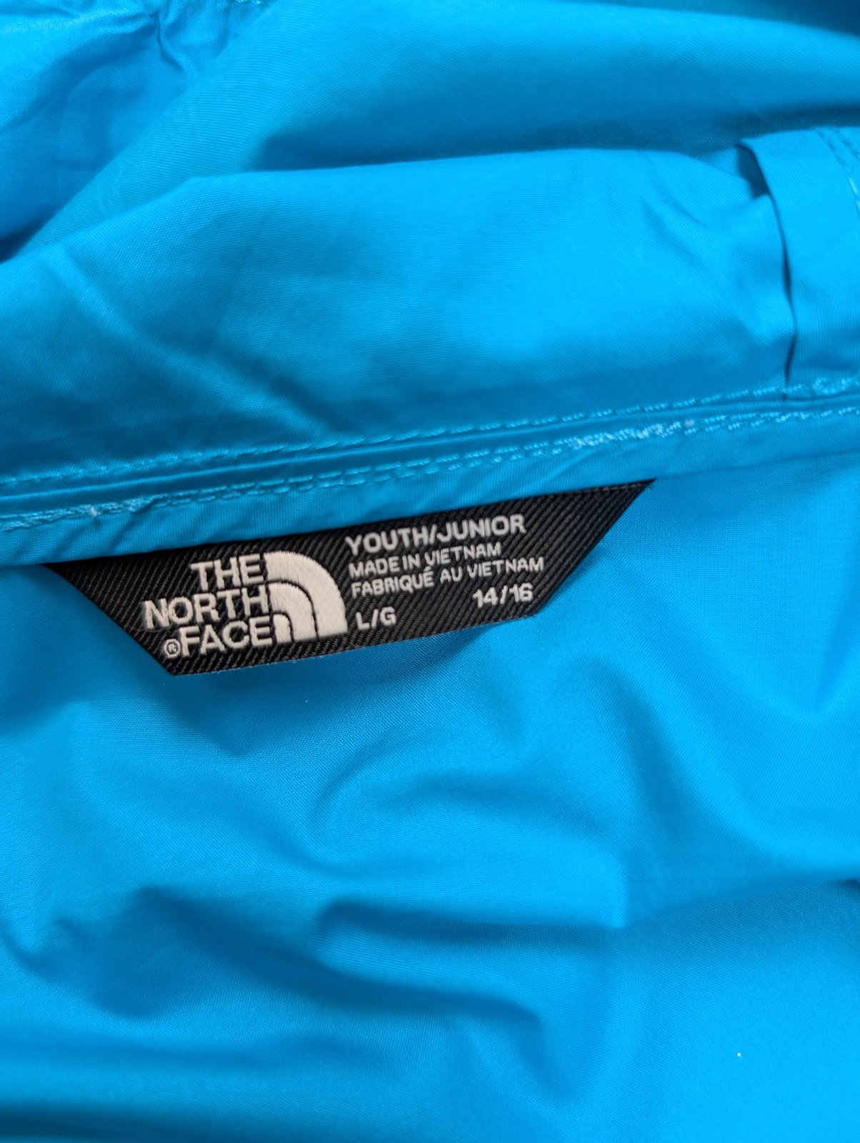 Coupe-vent The North Face WindWall Anorak Bleu Ciel Junior - Taille L 14/16