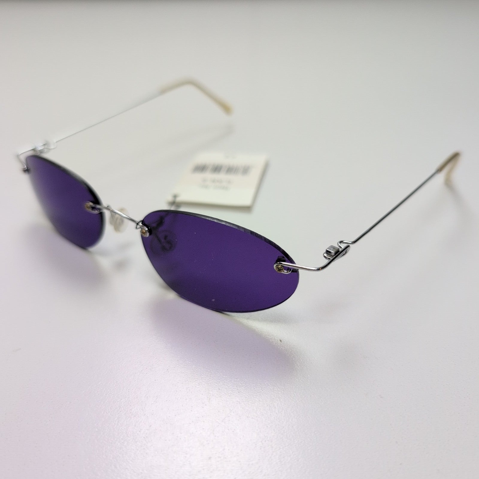 Lunettes de soleil Y2K Branche fine Métal chromé Sans monture Ovale Violet