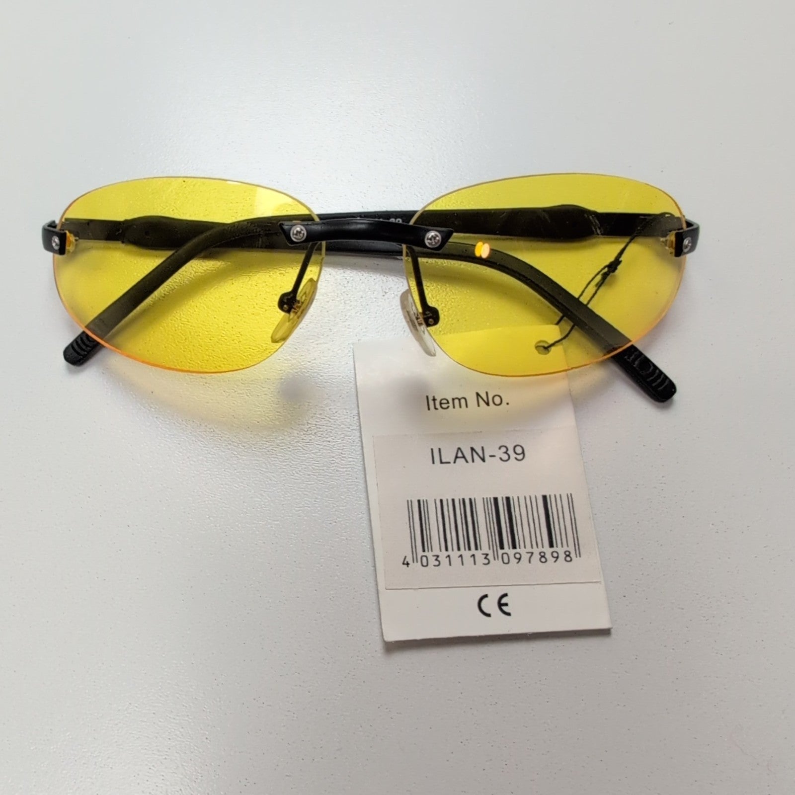 Lunettes de soleil Y2K Ovales Sans Monture Verres Jaunes Branches Noir Mat