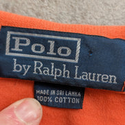 Polo manches courtes Polo Ralph Lauren M orange 100% coton logo bleu marine