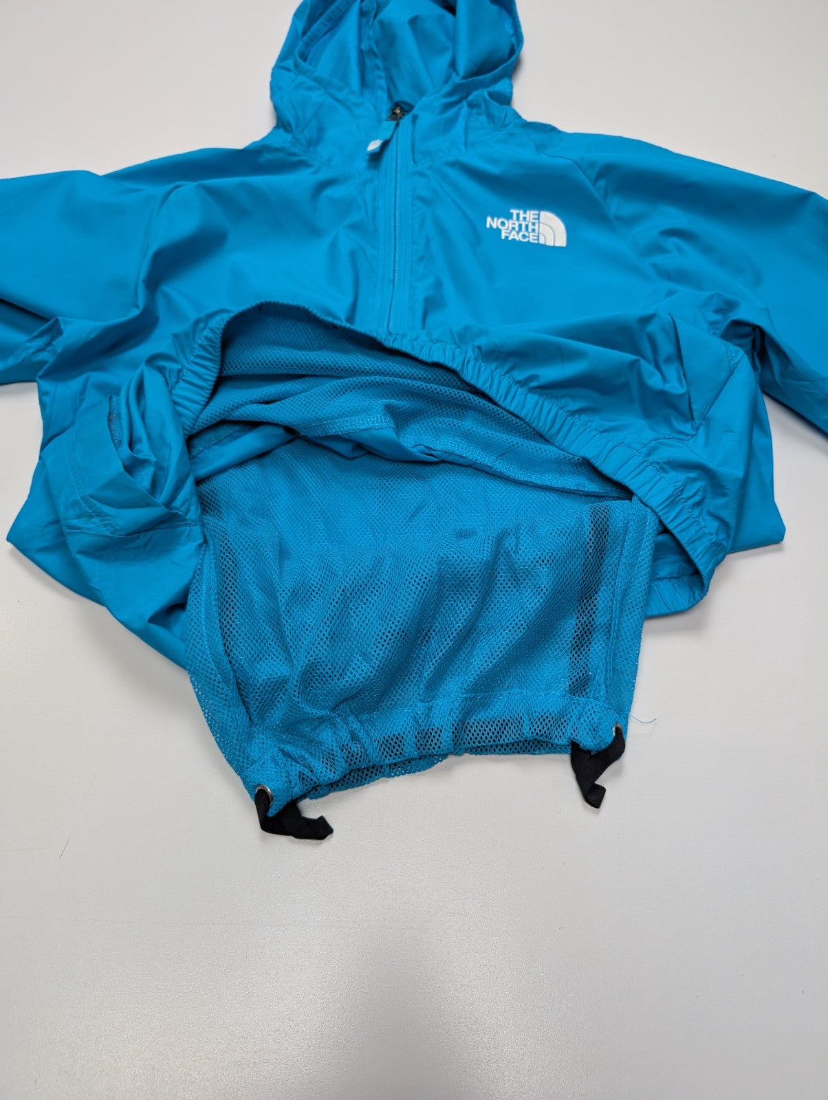 Coupe-vent The North Face WindWall Anorak Bleu Ciel Junior - Taille L 14/16