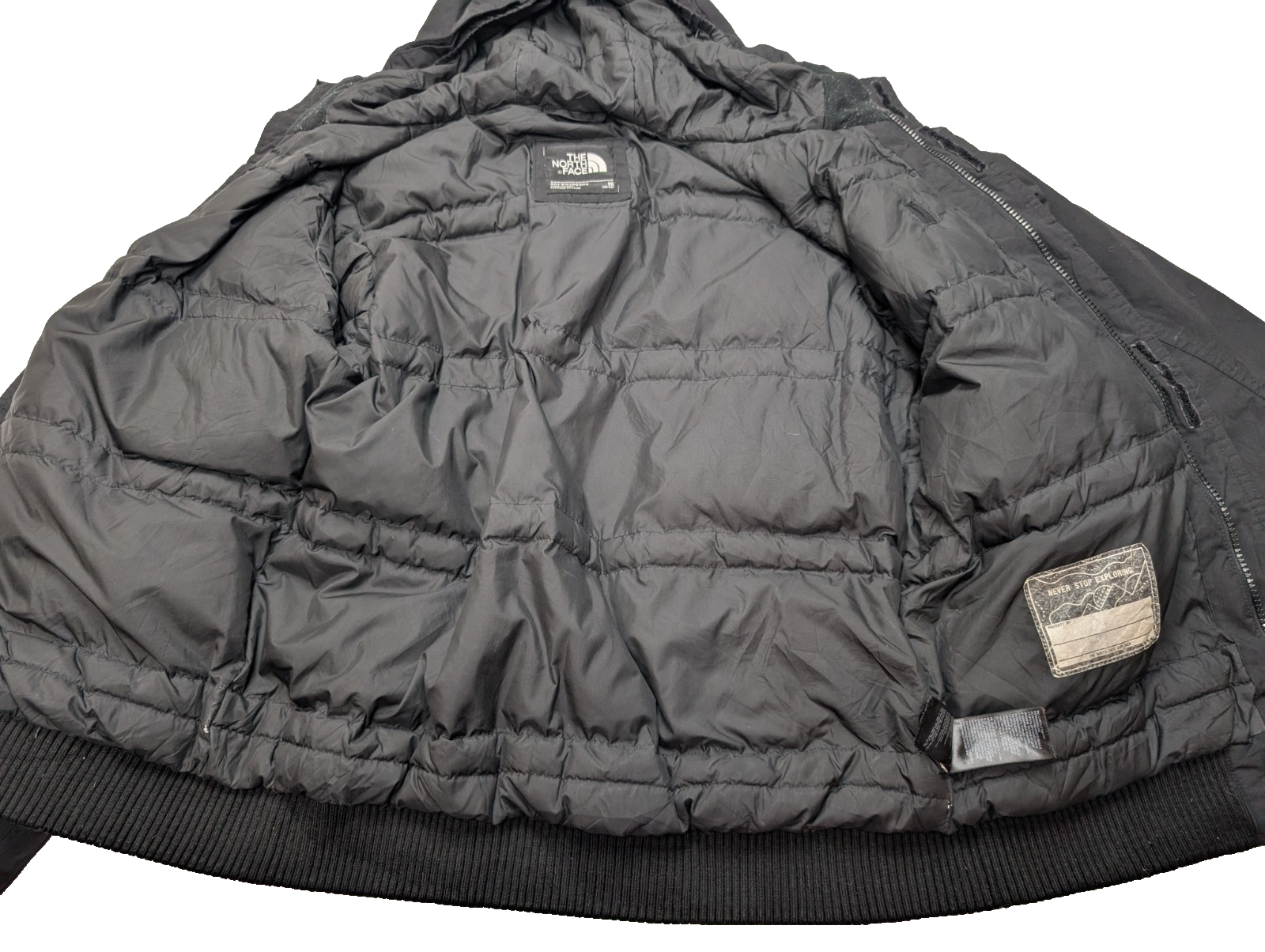 The North Face Doudoune Capuche Noire Plumes Junior XL Hiver