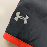Short Under Armour HeatGear Noir & Orange Fluo - Femme Taille S