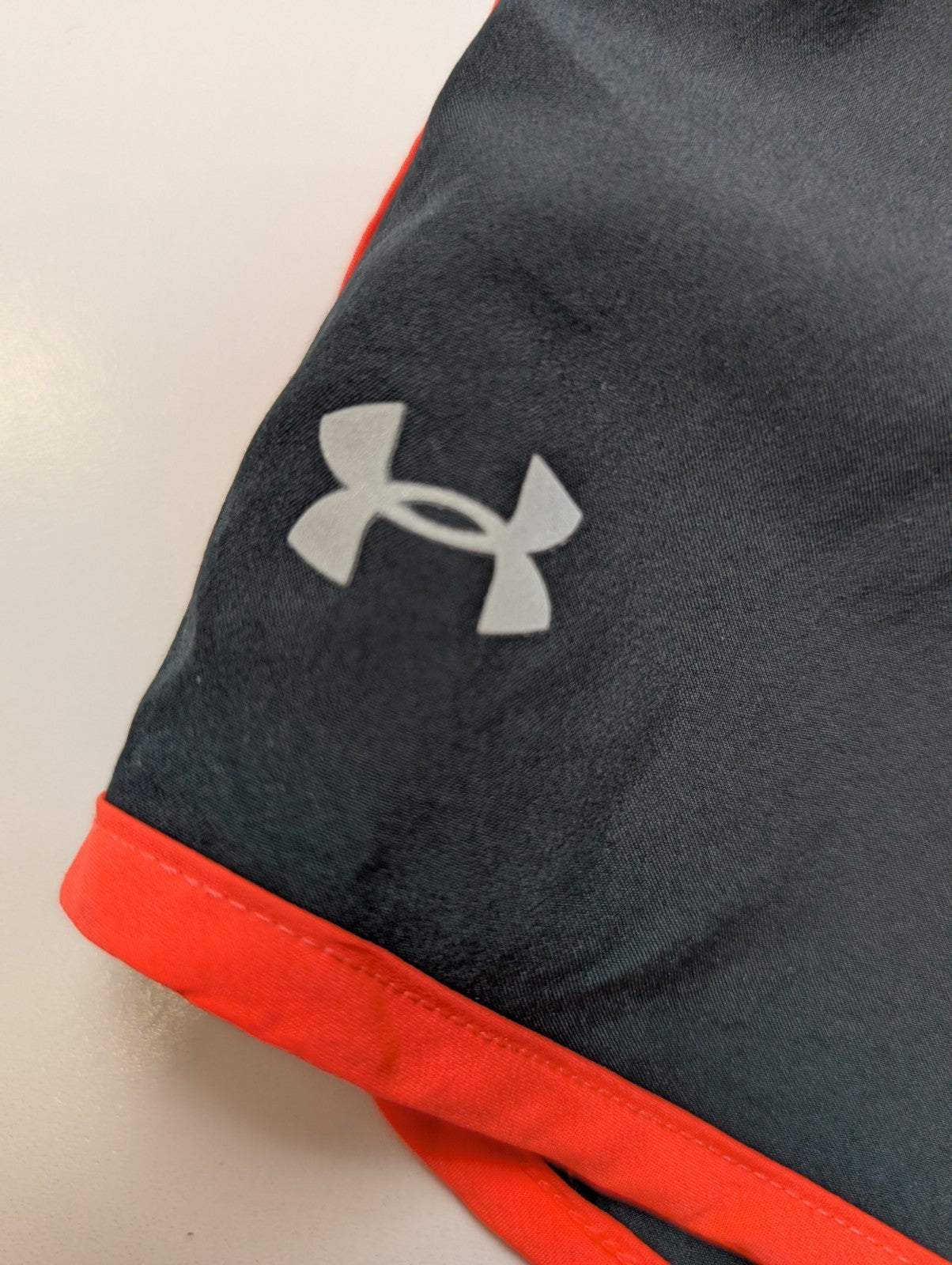 Short Under Armour HeatGear Noir & Orange Fluo - Femme Taille S