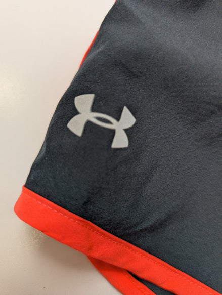 Short Under Armour HeatGear Noir & Orange Fluo - Femme Taille S