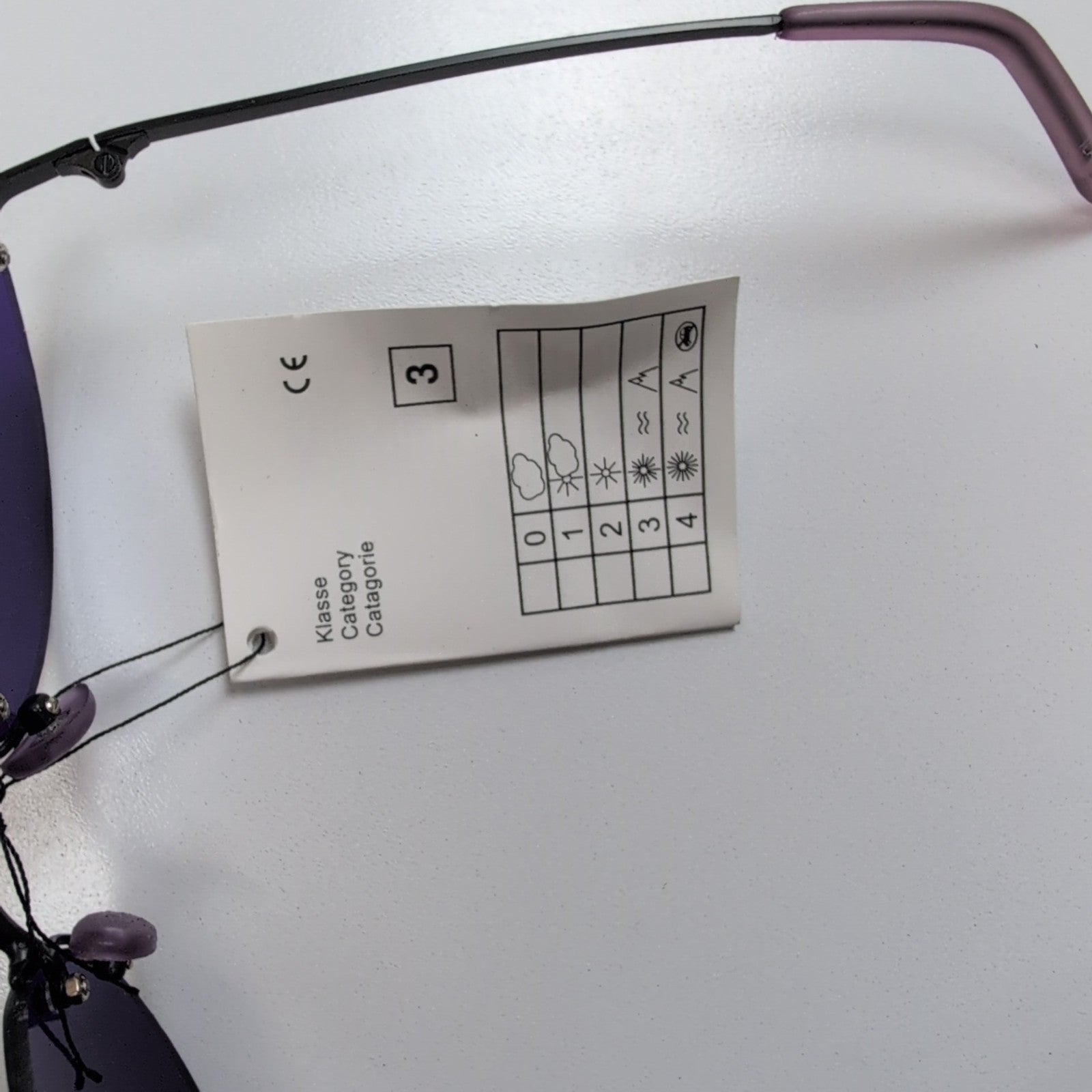Lunettes de soleil Y2K Sans Monture Verres Ovales Violet et Métal Noir Mat