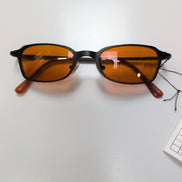Lunettes de soleil Cyber Y2K Ambre Branches Fines Monture Métal Noir brossé