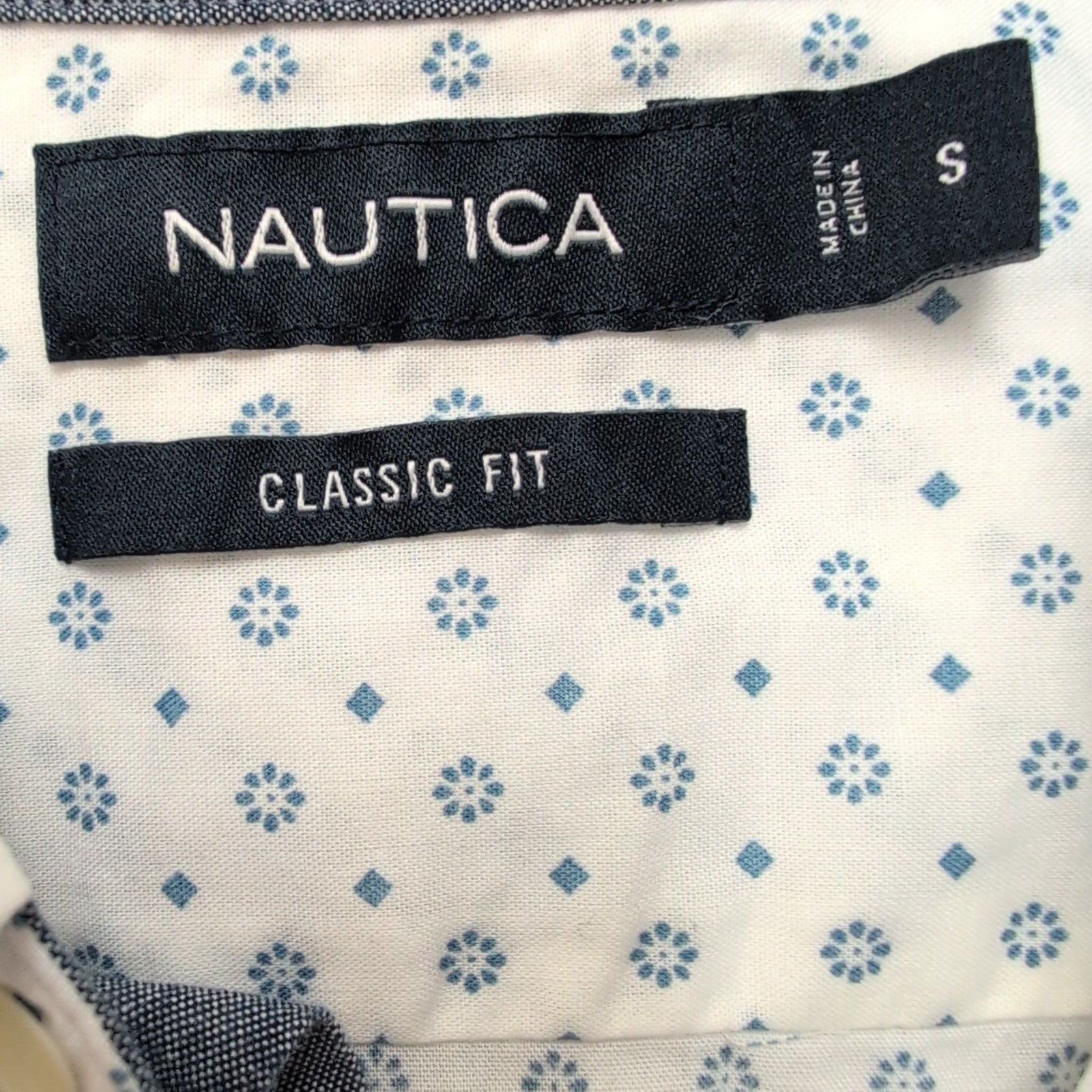 Chemise Nautica blanche motifs marguerites manches longues 1 poche L