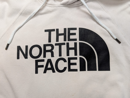The North Face Sweat à Capuche Blanc - Logo Noir Frontal - Taille M Femme