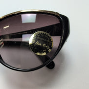 Lunettes de soleil Femmes Bar-On® Noir Brillant Liseré Doré Branches Larges Chic