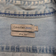 Chemise Calvin Klein bleue jean slim fit taille M #205e