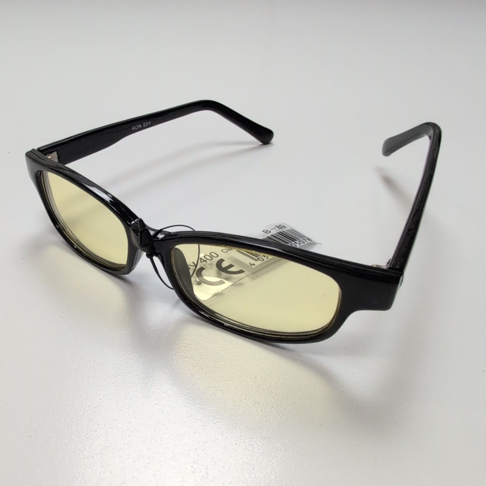 Lunettes de soleil Y2K Branches larges Noir brillant Verres jaunes