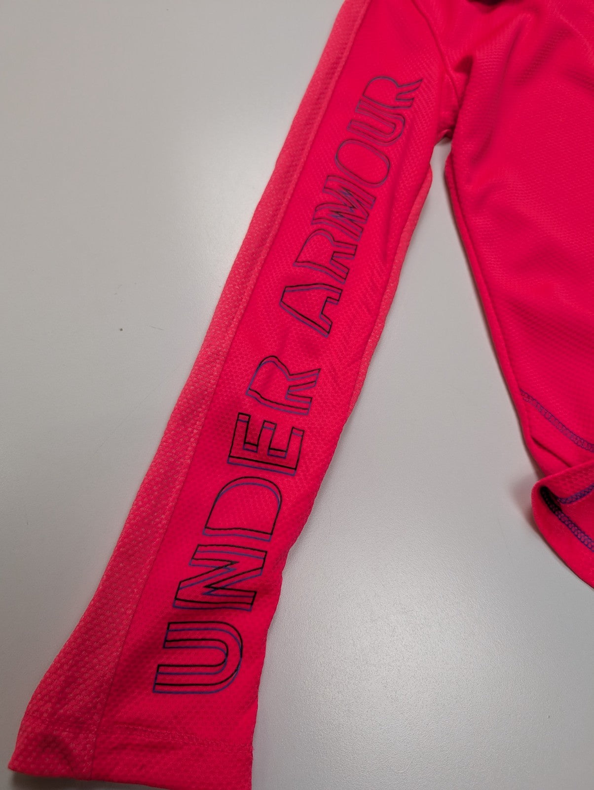 Haut Technique Under Armour HeatGear Rose Fluo Enfant XS