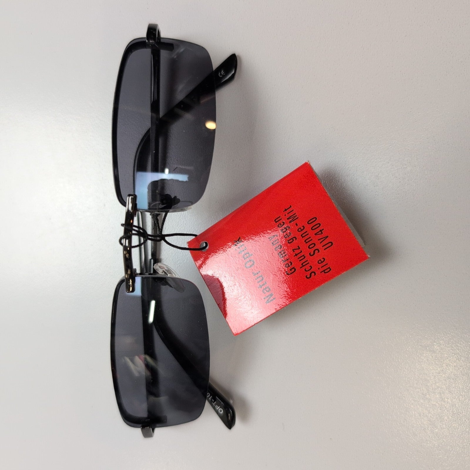 Lunettes de soleil Y2K Natur Optik Germany Métal Noir Brillant Branches fines