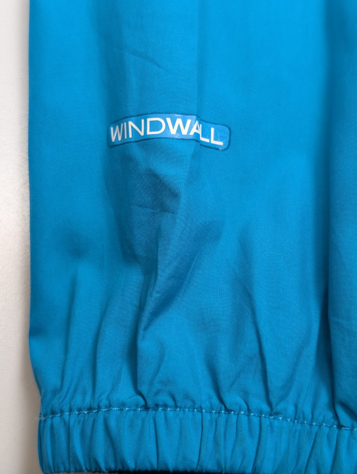 Coupe-vent The North Face WindWall Anorak Bleu Ciel Junior - Taille L 14/16