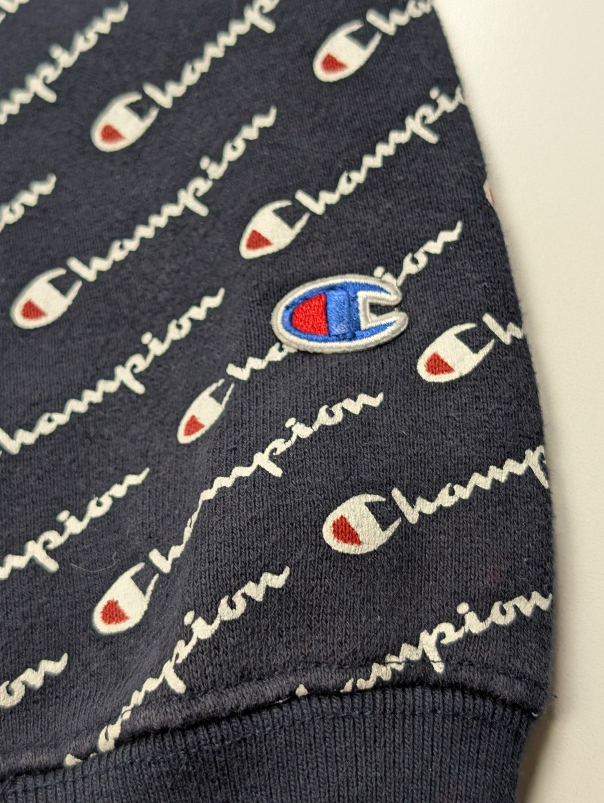 ➜ Sweat à Capuche Champion Vintage - Motif Multi-Logo All-Over - Taille L